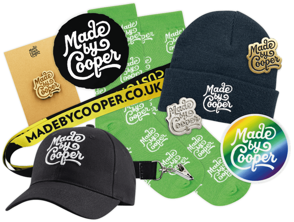 A pile of various Made By Cooper merchandising products