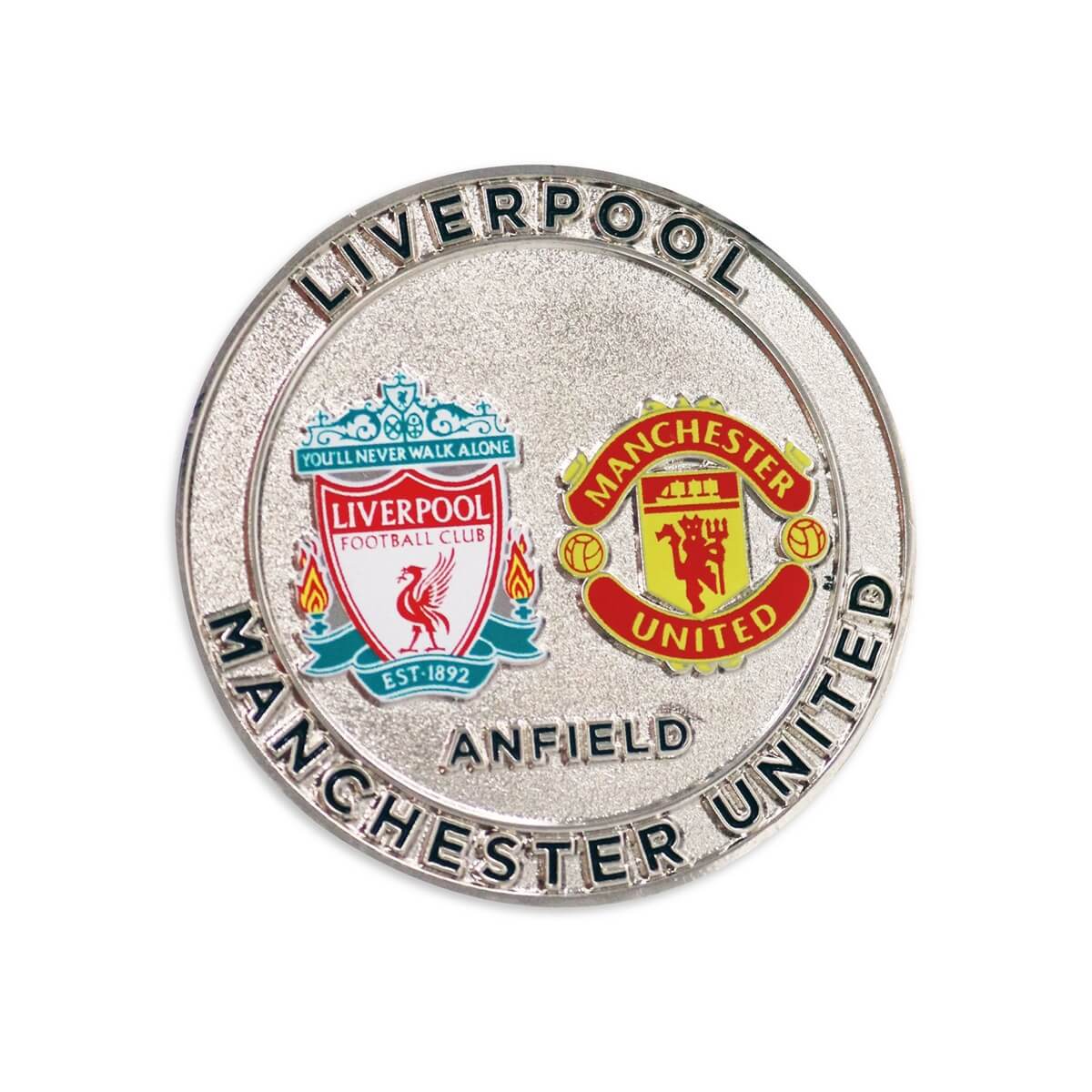A Liverpool versus Manchester United pin badge