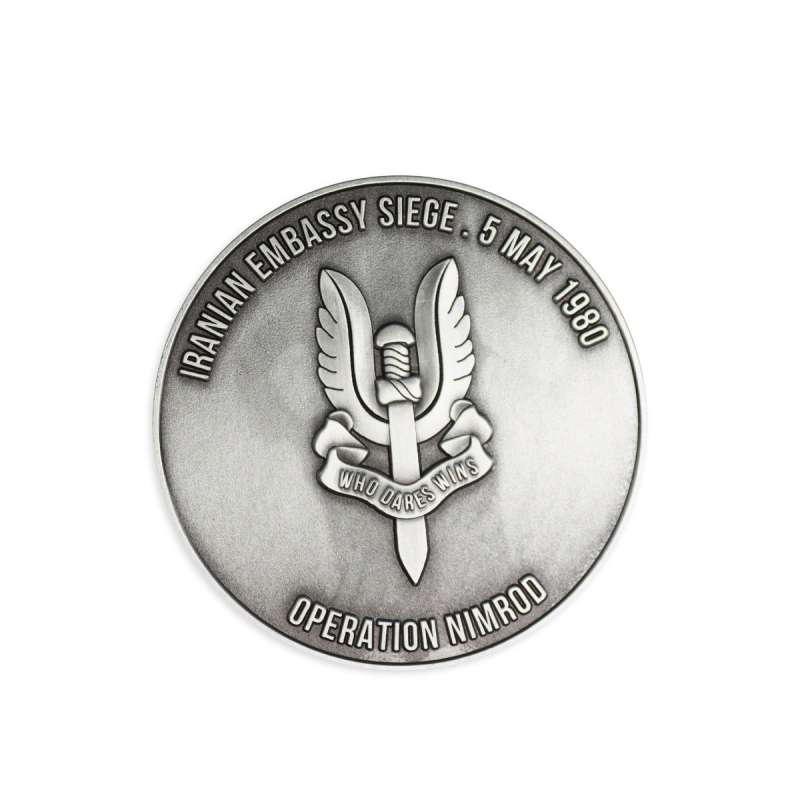 A custom coin with the SAS logo on it. Iranian Embassy Seige 5 May 1980, Operation Nimrod