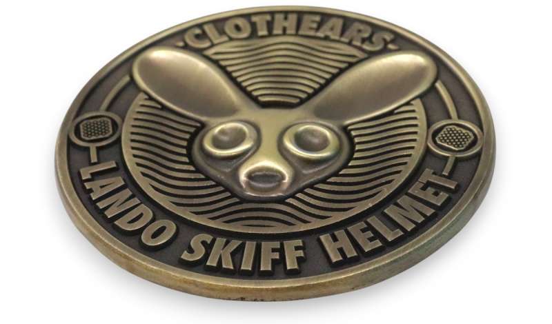 3D custom coin with raised rabbit design and layered detail, showing depth and sculpted finish compared to die-struck coins.