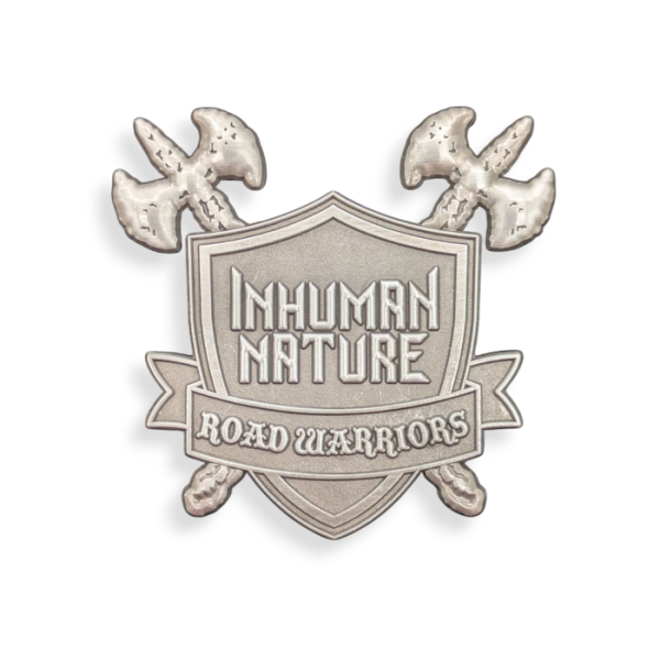 A 3D modelled pin badge in the shape of a shield with two axes behind it, with the