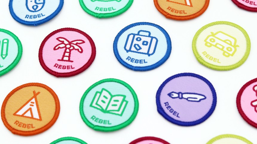 A collection of colourful woven patches for Rebel Badge Book.