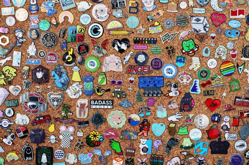 A pin wall display that features hundreds of enamel pins from all niches and industries.