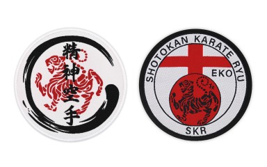 Two martial arts patches, both in red and black Japanese designs on a white background.