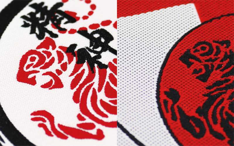A close up comparison of a basic woven patch and a regular woven patch.