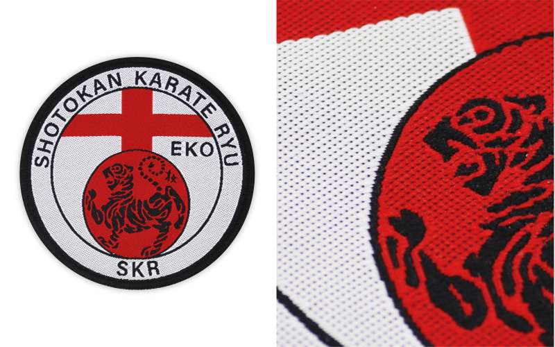 A martial arts patch with a close up showing the threads.