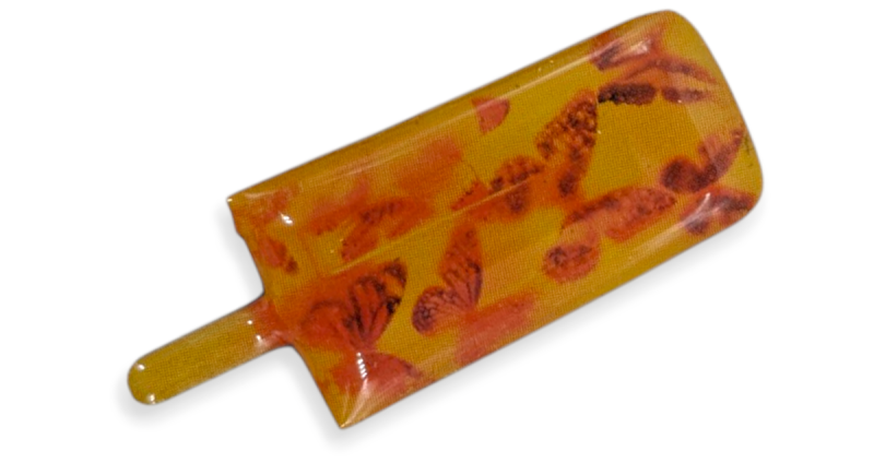 A orange lollipop shaped badge with gradient colours to make it look realistic.