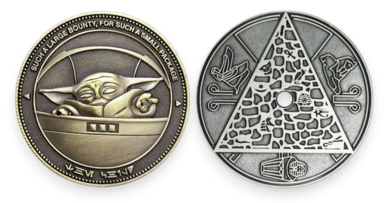 3D vs die-struck coins showing raised character design and flat engraved geometric coin, highlighting depth and surface detail.