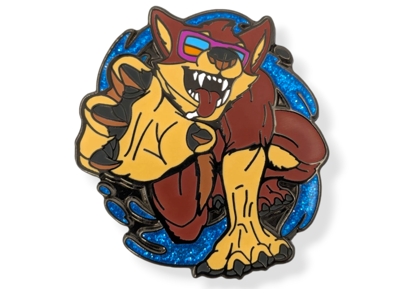 A pin badge of a cartoon dog wearing shades, the background has a sleek blue enamel glitter finish.