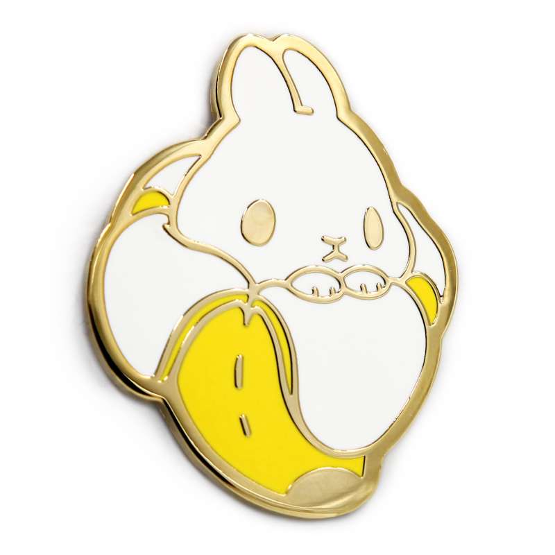 A hard enamel pin badge that sees the world's cutest cartoon bunny sat inside a banana peel. The Bunana.