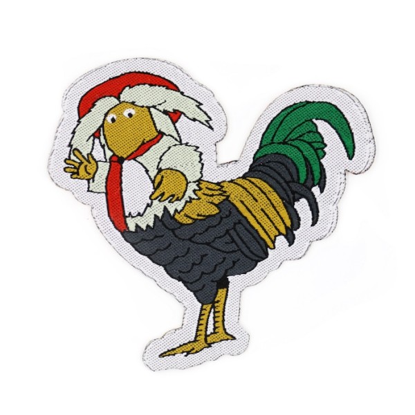 A weird woven patch that has the top half of a Womble and the legs of a chicken.