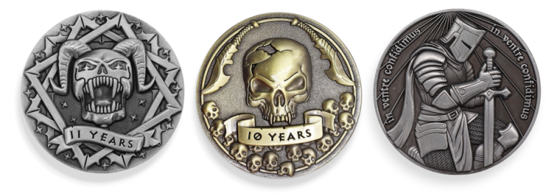 Collection of colourful fan-created video game pins and keyrings including characters and retro designs.