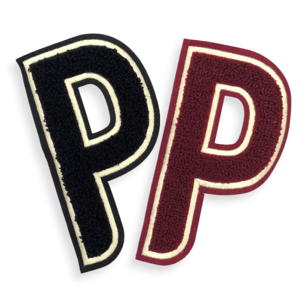 Two chenille letter patches featuring the letter P in a varsity style font. One patch is black with a white outline and the other chenille patch is burgundy with a white outline.
