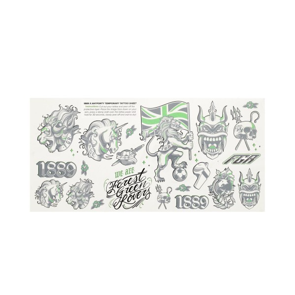 Lots of black, white, and green temporary colour tattoos. Demons, unicorns, and old english text tatts.