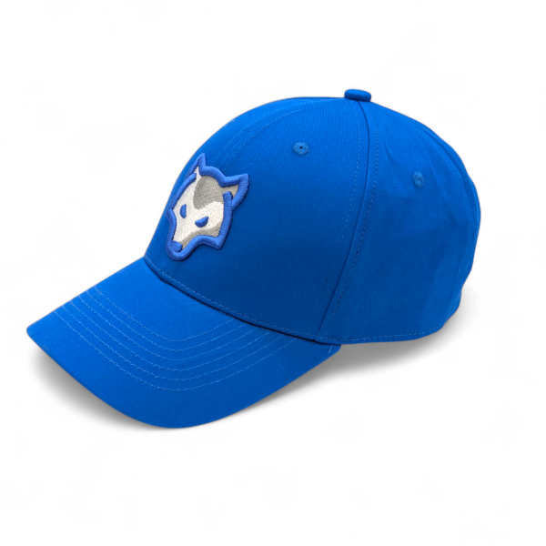 A royal blue personalised baseball cap with a silver wolf embroidered onto the front.