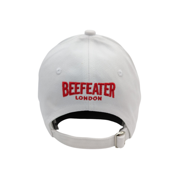 A while baseball hat with the words