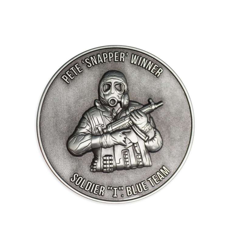 An SAS themed custom challenge coin featuring a masked soldier carrying a automatic machine gun.