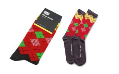 Custom pizza socks made with us by Ooni. The argyle pattern has been made to look like pizza slices.