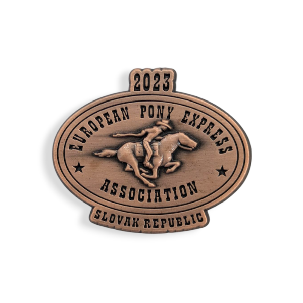 A die struck bespoke pin badge made to look like an American belt buckle with a horse on the front.