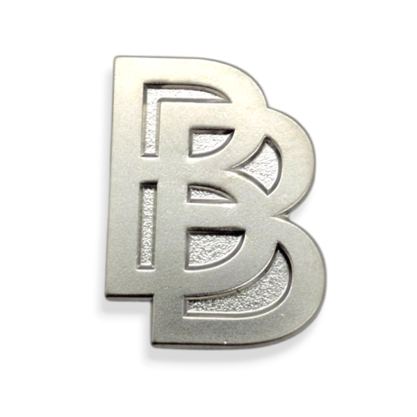 A silver-plated pin badge made to look like the Rolls Royce logo but instead of two Rs it has two Bs.