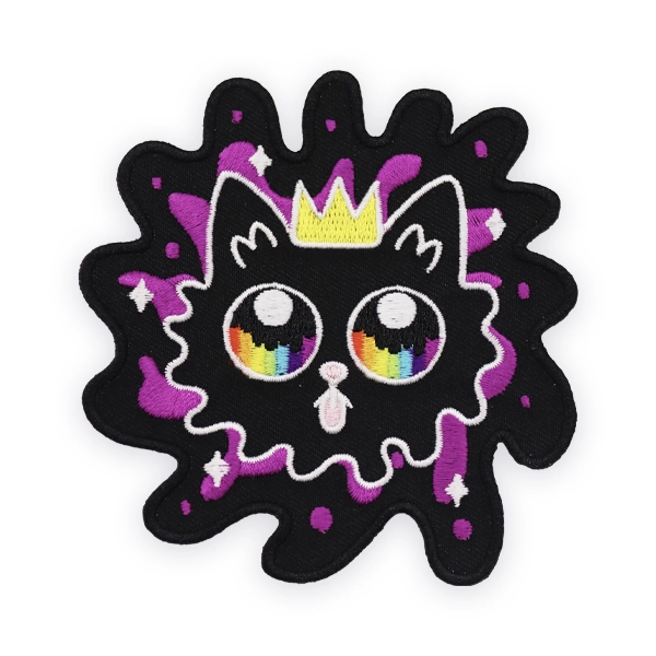 Cute embroidered patch featuring a black cat with rainbow eyes, purple accents and a small crown, stitched with bold thread colours, designed as a fun custom embroidered patch for jackets, bags or accessories.