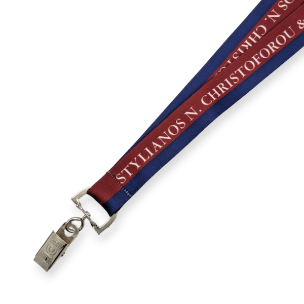 A burgundy and blue university lanyard with the school's branding in white text.