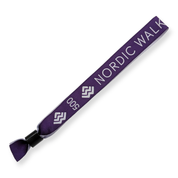 A purple fabric wristband wristband with white text that says