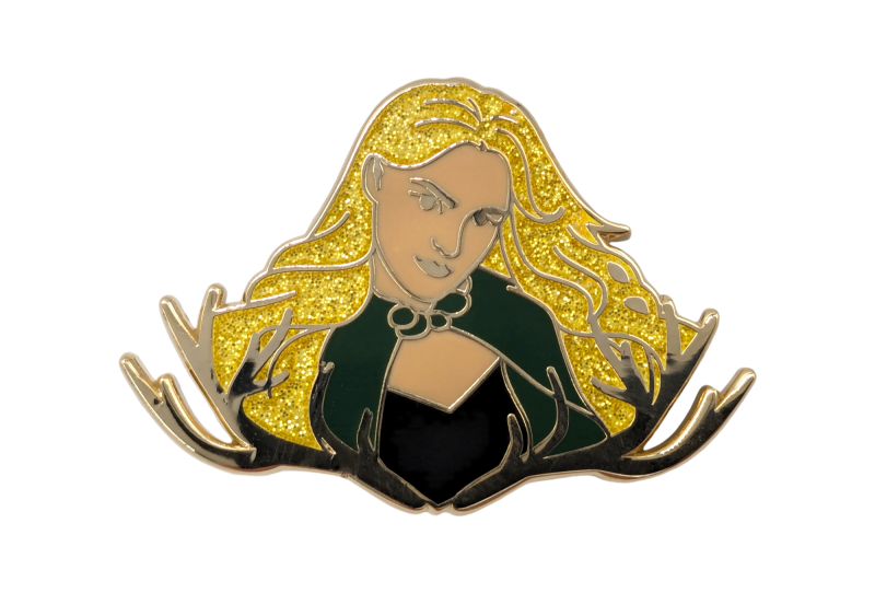 A female illustrated character pin badge with a black top and golden glittery hair.