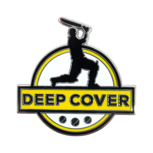 A cricket hard enamel lapel pin featuring a silhouette of a batsman striking a ball with the words