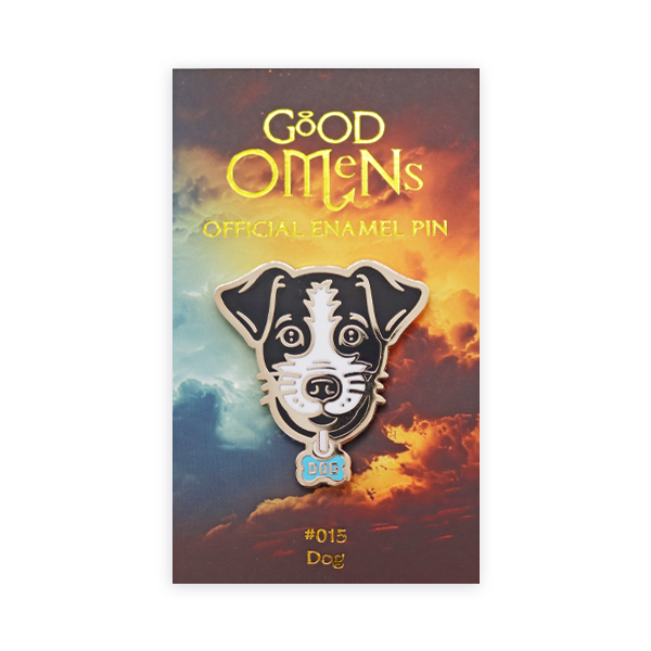 Hard enamel pin badge showing a stylised black and white dog illustration on an official Good Omens backing card, demonstrating detailed line work and the polished surface of hard enamel pin badges.