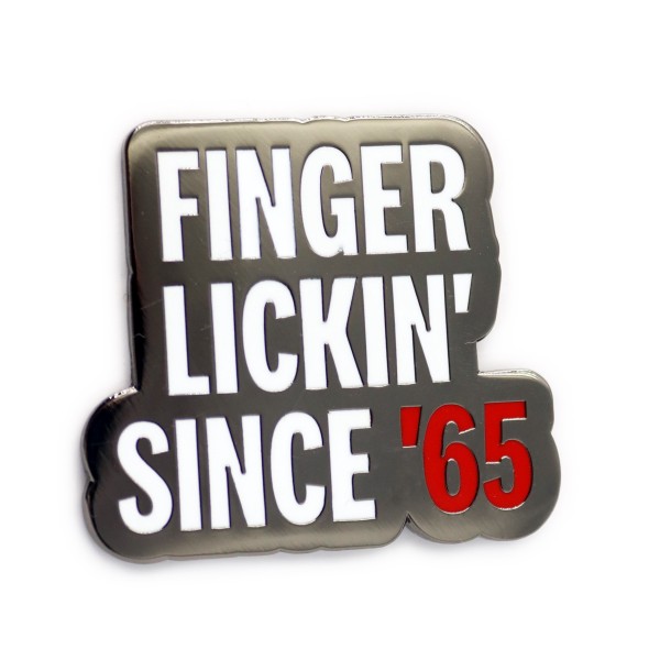 A hard enamel branding pin badge for KFC that says