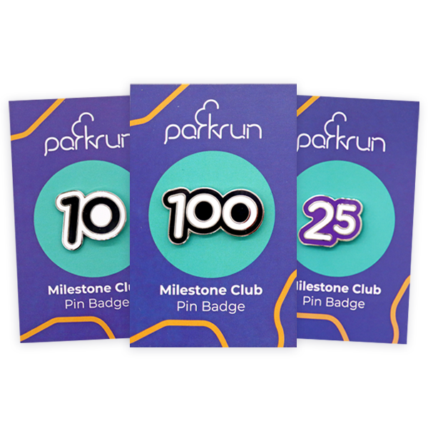 Set of hard enamel pin badges for parkrun milestones, featuring 10, 25 and 100 designs on branded backing cards, used to mark running achievements with durable enamel pins.