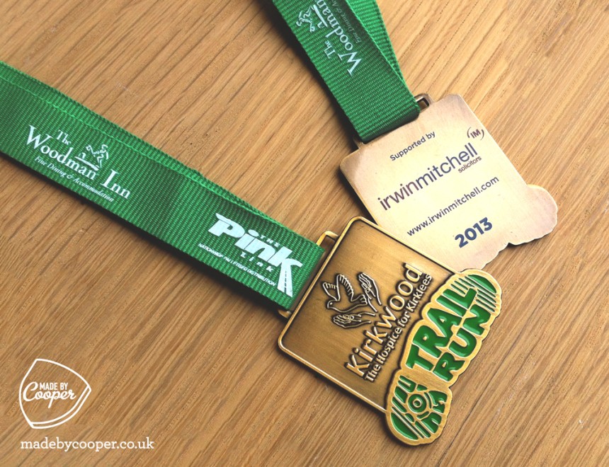 Kirkwood Hospice Trial run medals, Antique gold, soft enamel with green polyester lanyard with sponsors silkscreen printed
