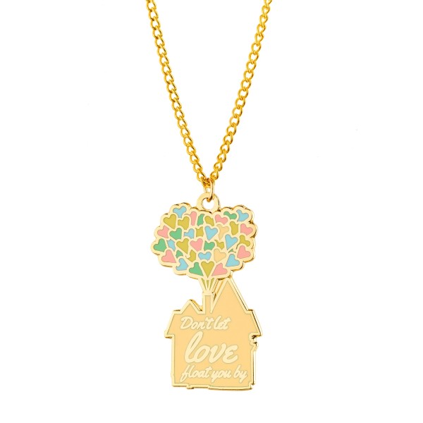 A enamel pendant in the shape of a house with colourful balloons above it.