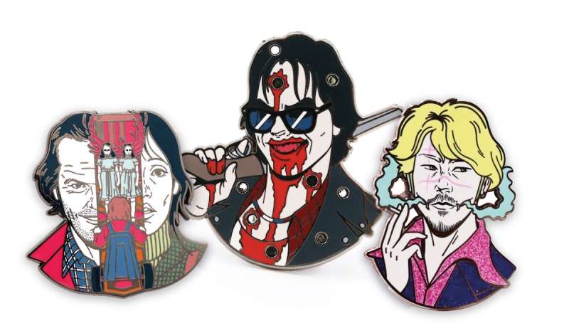 A collection of Nacho Scratcho collectable enamel pins in the horror and pop culture genre.