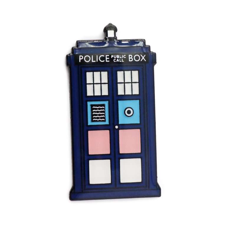 A Doctor Who TARDIS pin badge that displays the Trans Rights colours.
