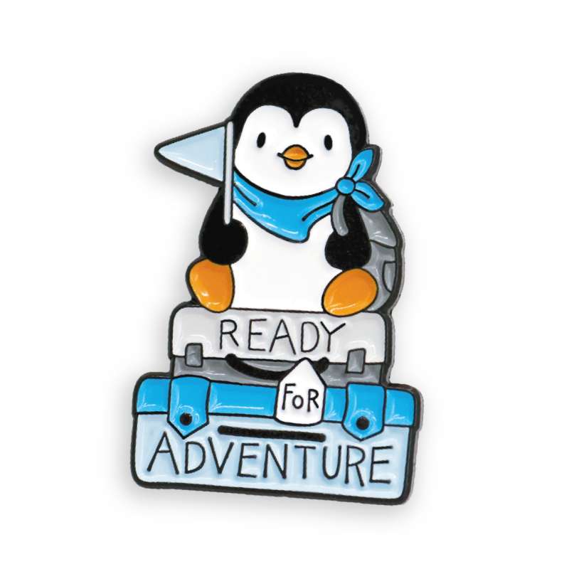 A small penguin pin badge. The badge is plated in black.