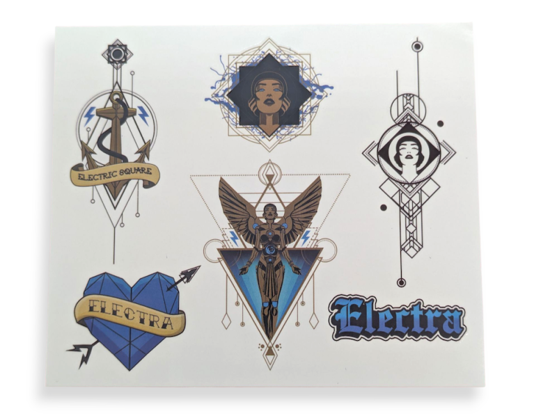 A sheet of fake tattoos for festivals and events. The tattoos look like tribal or Egyptian designs with geometric shapes and colours.