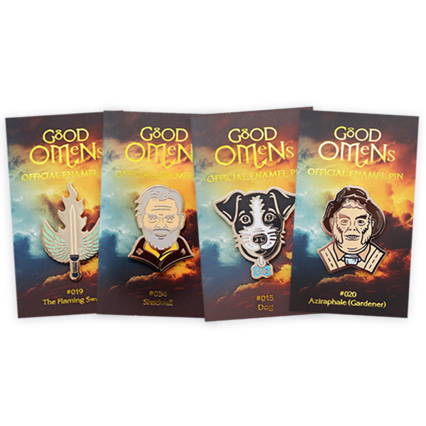 Collection of premium hard enamel pin badges featuring official Good Omens character designs on branded backing cards, demonstrating detailed artwork, flat enamel finish and collector quality production.