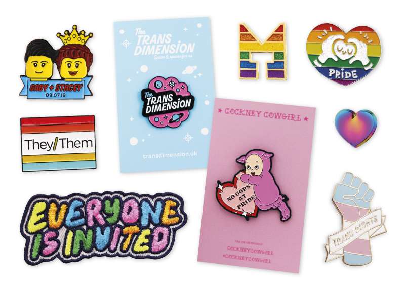 A collection of Pride pin badges supporting the LGBTQ+ community.