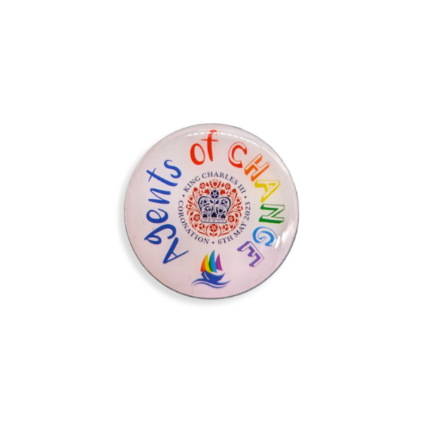 A circular custom printed pin badge featuring the royal seal of King Charles and the words