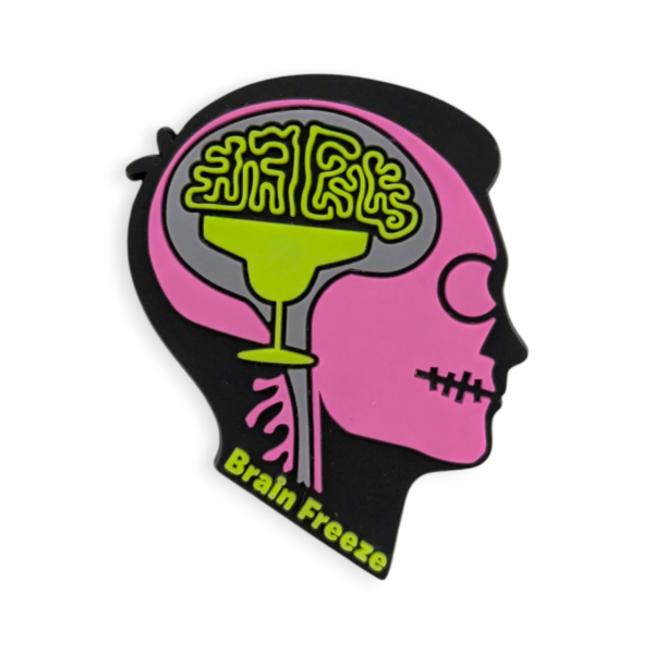 A colourful custom PVC pin in the shape of a person's head, and you can see through it to see the person's skull and brain.