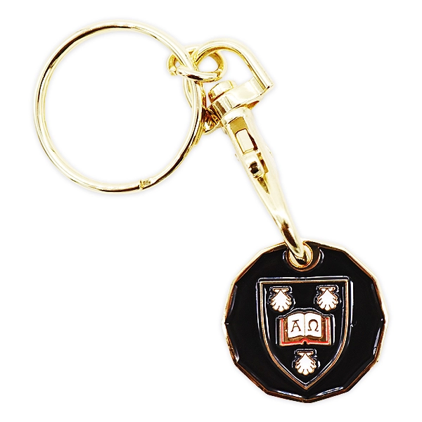 Trolley coin keyring featuring a black crest design with gold metal finish and integrated coin holder, showing how trolley coin keyrings work for everyday use.