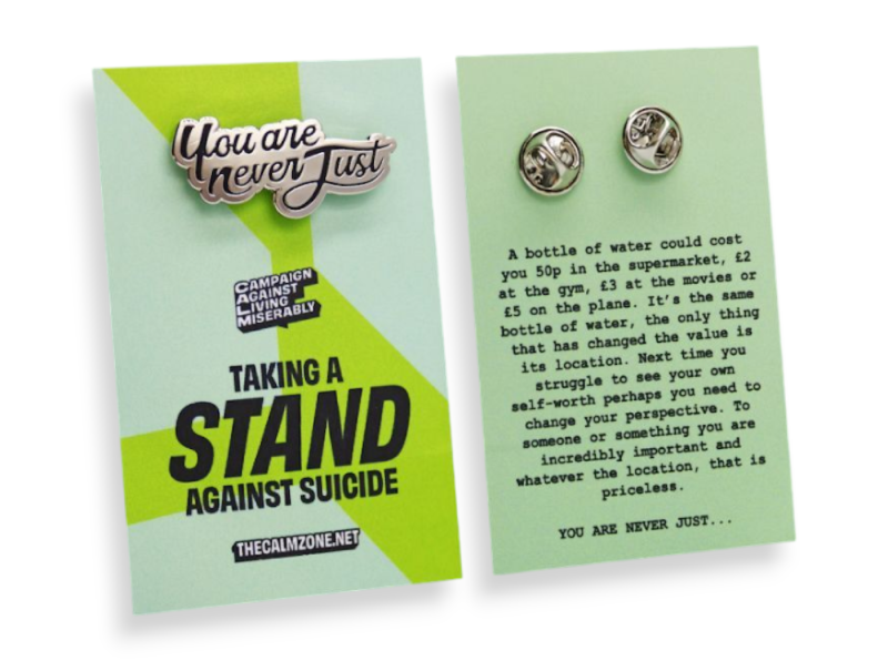Taking a Stand pin badges that represent the fight against suicide.