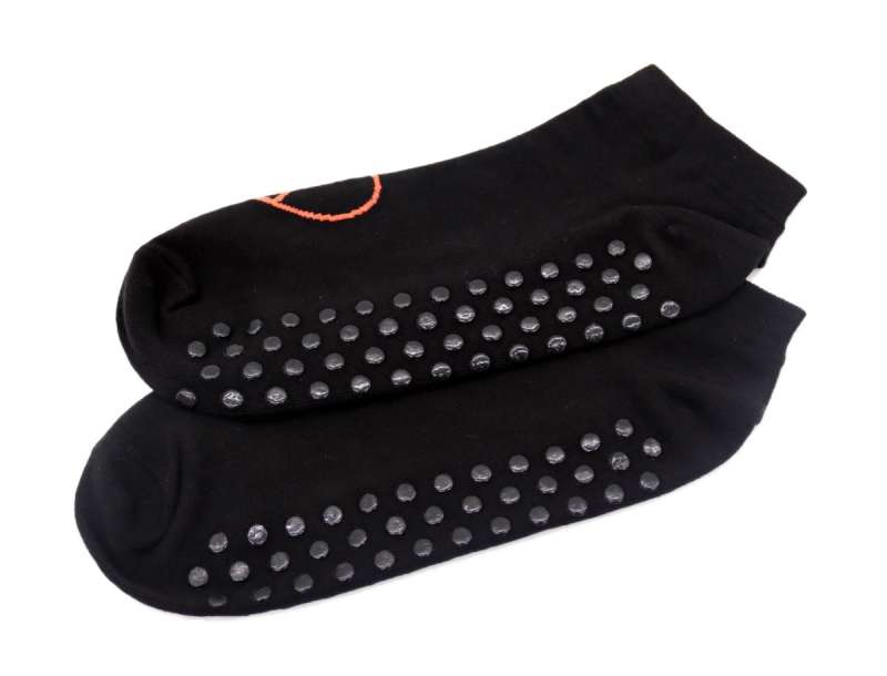 Black anti-slip socks with a black rubberised pattern.